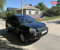 Черный Хендай Туксон, объемом двигателя 2 л и пробегом 255 тыс. км за 7150 $, фото 5 на Automoto.ua