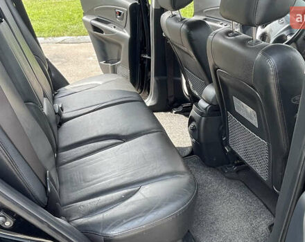 Черный Хендай Туксон, объемом двигателя 2 л и пробегом 236 тыс. км за 6950 $, фото 10 на Automoto.ua