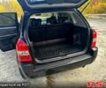 Черный Хендай Туксон, объемом двигателя 2 л и пробегом 250 тыс. км за 7500 $, фото 3 на Automoto.ua