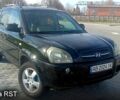 Черный Хендай Туксон, объемом двигателя 2 л и пробегом 260 тыс. км за 8000 $, фото 5 на Automoto.ua