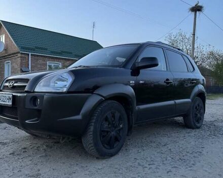 Чорний Хендай Туксон, об'ємом двигуна 2 л та пробігом 195 тис. км за 8500 $, фото 2 на Automoto.ua