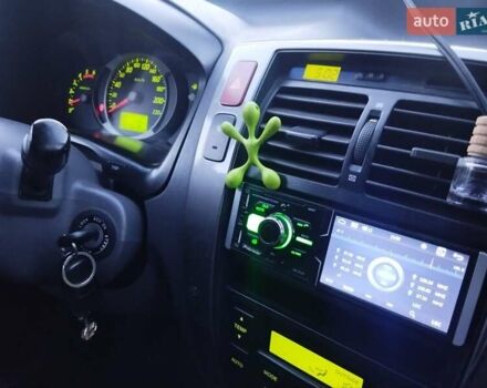 Чорний Хендай Туксон, об'ємом двигуна 1.99 л та пробігом 239 тис. км за 6990 $, фото 22 на Automoto.ua