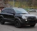 Черный Хендай Туксон, объемом двигателя 2.7 л и пробегом 217 тыс. км за 8600 $, фото 2 на Automoto.ua