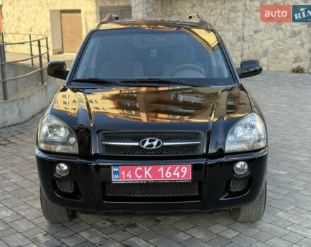 Черный Хендай Туксон, объемом двигателя 2 л и пробегом 249 тыс. км за 7450 $, фото 5 на Automoto.ua