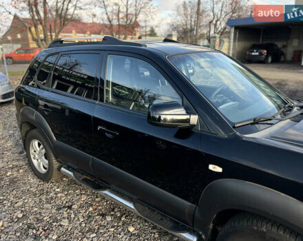 Черный Хендай Туксон, объемом двигателя 1.98 л и пробегом 191 тыс. км за 8300 $, фото 29 на Automoto.ua