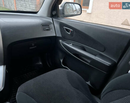 Черный Хендай Туксон, объемом двигателя 1.98 л и пробегом 227 тыс. км за 6900 $, фото 22 на Automoto.ua