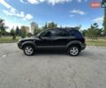 Чорний Хендай Туксон, об'ємом двигуна 2 л та пробігом 249 тис. км за 5800 $, фото 4 на Automoto.ua
