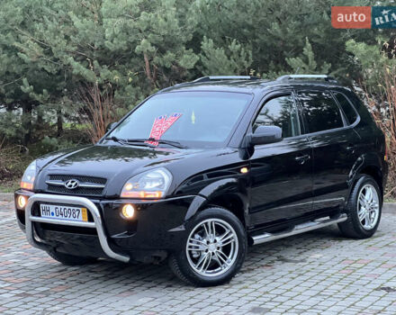 Чорний Хендай Туксон, об'ємом двигуна 1.98 л та пробігом 170 тис. км за 6999 $, фото 9 на Automoto.ua