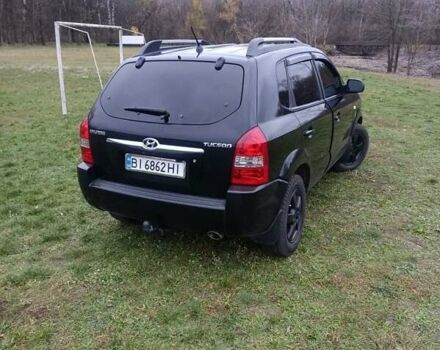 Черный Хендай Туксон, объемом двигателя 2 л и пробегом 220 тыс. км за 8300 $, фото 2 на Automoto.ua