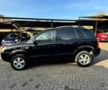Чорний Хендай Туксон, об'ємом двигуна 2 л та пробігом 207 тис. км за 8000 $, фото 4 на Automoto.ua