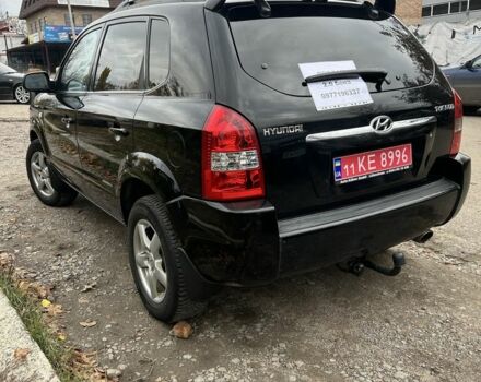 Черный Хендай Туксон, объемом двигателя 2 л и пробегом 159 тыс. км за 8650 $, фото 3 на Automoto.ua