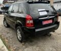 Черный Хендай Туксон, объемом двигателя 2 л и пробегом 159 тыс. км за 8650 $, фото 3 на Automoto.ua