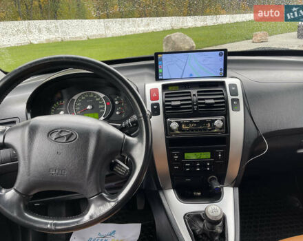 Черный Хендай Туксон, объемом двигателя 2 л и пробегом 216 тыс. км за 7500 $, фото 39 на Automoto.ua