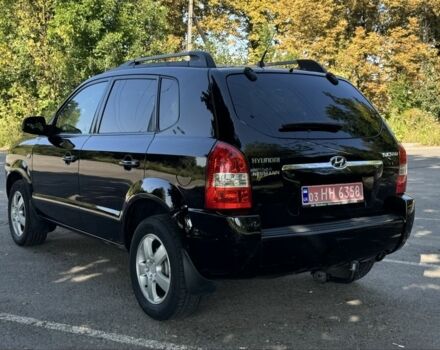 Черный Хендай Туксон, объемом двигателя 2 л и пробегом 266 тыс. км за 7700 $, фото 2 на Automoto.ua