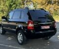 Черный Хендай Туксон, объемом двигателя 2 л и пробегом 266 тыс. км за 7700 $, фото 2 на Automoto.ua