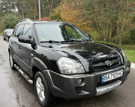 Черный Хендай Туксон, объемом двигателя 2 л и пробегом 209 тыс. км за 7800 $, фото 3 на Automoto.ua