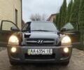 Черный Хендай Туксон, объемом двигателя 2 л и пробегом 186 тыс. км за 9400 $, фото 1 на Automoto.ua