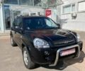 Чорний Хендай Туксон, об'ємом двигуна 2 л та пробігом 230 тис. км за 7300 $, фото 2 на Automoto.ua