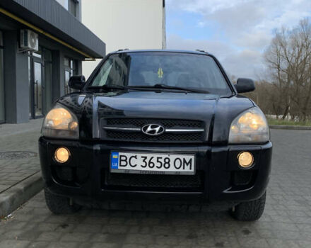 Черный Хендай Туксон, объемом двигателя 1.99 л и пробегом 290 тыс. км за 7700 $, фото 14 на Automoto.ua