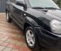 Чорний Хендай Туксон, об'ємом двигуна 1.98 л та пробігом 202 тис. км за 7350 $, фото 1 на Automoto.ua