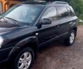 Черный Хендай Туксон, объемом двигателя 2 л и пробегом 230 тыс. км за 7000 $, фото 1 на Automoto.ua