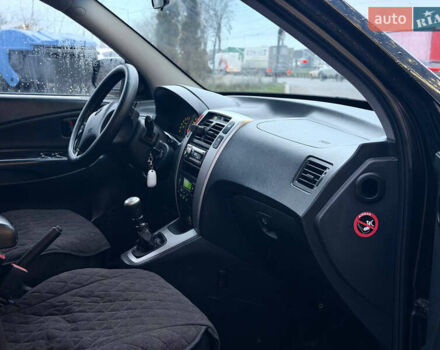 Чорний Хендай Туксон, об'ємом двигуна 1.99 л та пробігом 310 тис. км за 6399 $, фото 22 на Automoto.ua