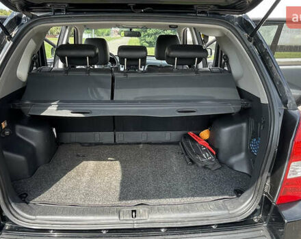 Черный Хендай Туксон, объемом двигателя 2 л и пробегом 236 тыс. км за 6950 $, фото 12 на Automoto.ua