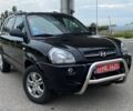 Черный Хендай Туксон, объемом двигателя 2 л и пробегом 184 тыс. км за 7199 $, фото 1 на Automoto.ua