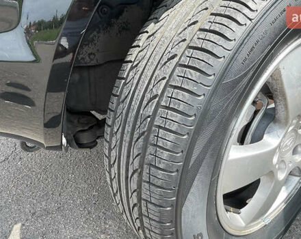 Черный Хендай Туксон, объемом двигателя 2 л и пробегом 236 тыс. км за 6950 $, фото 14 на Automoto.ua