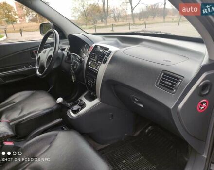 Черный Хендай Туксон, объемом двигателя 2 л и пробегом 237 тыс. км за 7999 $, фото 33 на Automoto.ua