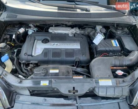 Черный Хендай Туксон, объемом двигателя 1.98 л и пробегом 196 тыс. км за 7700 $, фото 14 на Automoto.ua