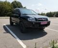 Черный Хендай Туксон, объемом двигателя 2 л и пробегом 178 тыс. км за 7600 $, фото 1 на Automoto.ua