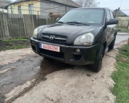 Черный Хендай Туксон, объемом двигателя 2 л и пробегом 395 тыс. км за 4500 $, фото 11 на Automoto.ua