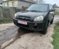 Черный Хендай Туксон, объемом двигателя 2 л и пробегом 395 тыс. км за 4500 $, фото 11 на Automoto.ua