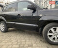 Черный Хендай Туксон, объемом двигателя 1.99 л и пробегом 290 тыс. км за 7700 $, фото 28 на Automoto.ua