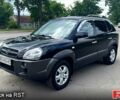 Черный Хендай Туксон, объемом двигателя 2 л и пробегом 192 тыс. км за 7700 $, фото 2 на Automoto.ua