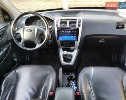 Черный Хендай Туксон, объемом двигателя 2 л и пробегом 195 тыс. км за 8300 $, фото 6 на Automoto.ua