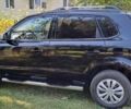 Чорний Хендай Туксон, об'ємом двигуна 1.98 л та пробігом 173 тис. км за 6900 $, фото 4 на Automoto.ua