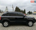 Черный Хендай Туксон, объемом двигателя 1.98 л и пробегом 250 тыс. км за 7150 $, фото 4 на Automoto.ua