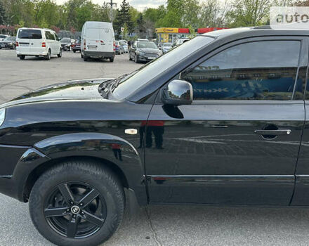 Черный Хендай Туксон, объемом двигателя 1.98 л и пробегом 133 тыс. км за 8350 $, фото 12 на Automoto.ua