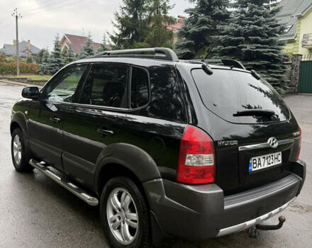Черный Хендай Туксон, объемом двигателя 2 л и пробегом 209 тыс. км за 7800 $, фото 12 на Automoto.ua