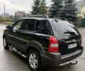 Черный Хендай Туксон, объемом двигателя 2 л и пробегом 209 тыс. км за 7800 $, фото 12 на Automoto.ua