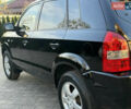 Черный Хендай Туксон, объемом двигателя 2 л и пробегом 249 тыс. км за 7450 $, фото 12 на Automoto.ua