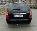 Черный Хендай Туксон, объемом двигателя 2 л и пробегом 242 тыс. км за 6999 $, фото 3 на Automoto.ua