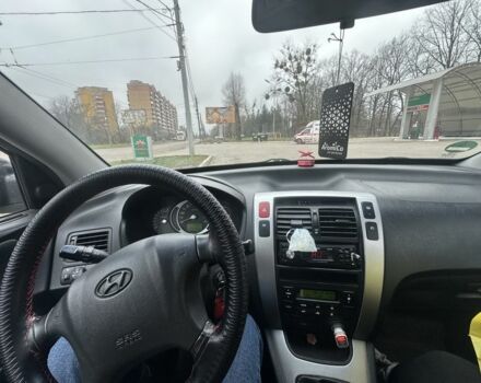 Черный Хендай Туксон, объемом двигателя 2 л и пробегом 174 тыс. км за 8000 $, фото 4 на Automoto.ua