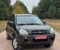 Черный Хендай Туксон, объемом двигателя 2 л и пробегом 209 тыс. км за 7600 $, фото 1 на Automoto.ua