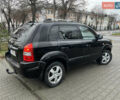 Черный Хендай Туксон, объемом двигателя 2 л и пробегом 242 тыс. км за 6999 $, фото 2 на Automoto.ua