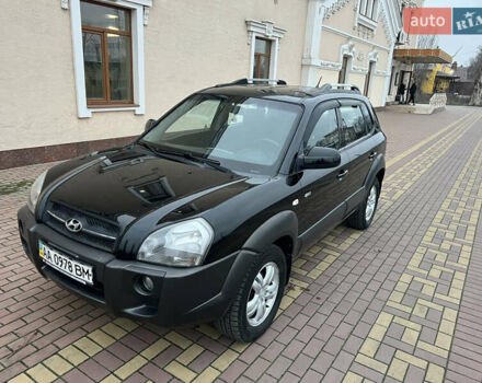 Черный Хендай Туксон, объемом двигателя 1.98 л и пробегом 227 тыс. км за 6900 $, фото 6 на Automoto.ua