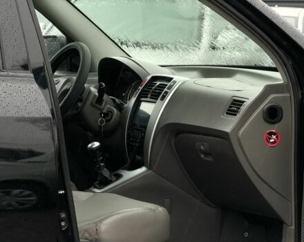 Черный Хендай Туксон, объемом двигателя 2 л и пробегом 263 тыс. км за 7950 $, фото 13 на Automoto.ua