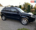 Чорний Хендай Туксон, об'ємом двигуна 1.98 л та пробігом 233 тис. км за 7650 $, фото 2 на Automoto.ua